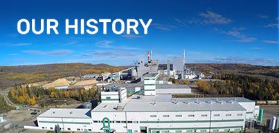 Aerial view of an ERCO facility with a text overlay that reads "OUR HISTORY"