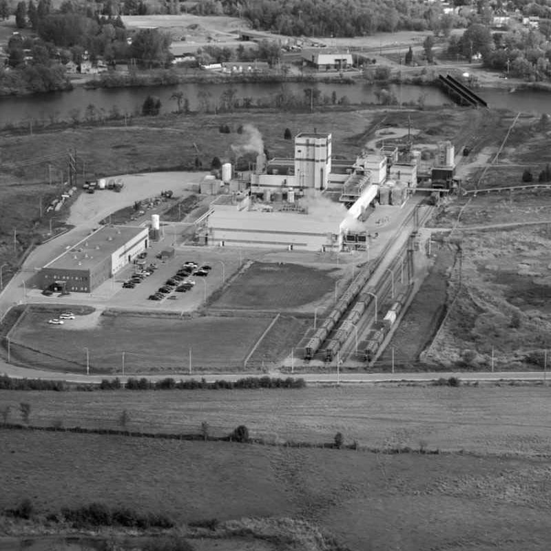 A black and white aerial view of an older ERCO facility
